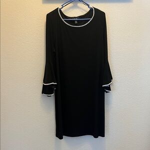 Elegant Black Dress with White Trim